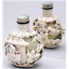 Image 1 : An ivory globular bottle relief carved with c...