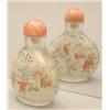 Image 1 : An inside painted glass bottle decorated with...