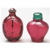 Image 1 : A Beijing red glass bottle carved with a larg...