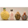Image 1 : A yellow glass bottle carved as a caparisonne...