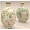 Image 1 : A large polychrome moulded porcelain bottle d...