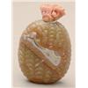 Image 1 : An agate fruit-form bottle carved in relief w...
