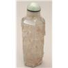 Image 1 : A large rock crystal hexagonal bottle carved...
