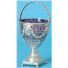 Image 1 : A George III pierced and chased silver sugar vase with swing handle and beaded borders, the sides...