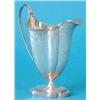Image 1 : A George III silver cream jug of faceted vase form with reeded rim, the shaped sides with bright...