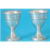 Image 1 : A pair of George III silver vase shaped egg cups, each engraved with an axe crest, Makers R & D H...