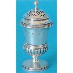 A George III silver urn shaped pepper caster, the slightly domed lid with ball finial, the partly...