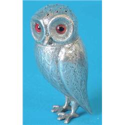 A Victorian silver pepper caster in the form of an owl with glass eyes, Maker George Fox. 1863, 3...
