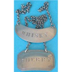 A George III Scottish silver crescent shaped wine label engraved Whisky, maker's mark only ND, ci...