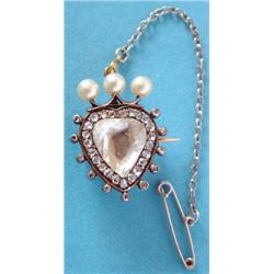 A Georgian gold and silver heart shaped brooch/pendant, the central flat cut top heart shaped dia...