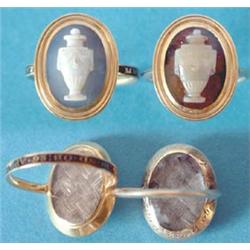 A George III gold mourning ring, the oval bezel inset with a blue agate cameo carved with a class...