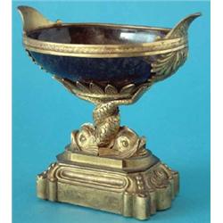 A 19th century ormolu mounted blue john oval bowl on 2 entwined dolphin supports and rectangular...