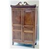 Image 1 : A George III mahogany hanging cupboard, the scroll cresting with gilt metal displayed eagle and p...