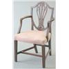 Image 1 : A George III mahogany Hepplewhite style shield back open armchair with channelled frame and domed...