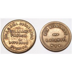 Two Wyoming billiards tokens