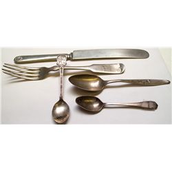 Five pieces of silverware: mostly silver