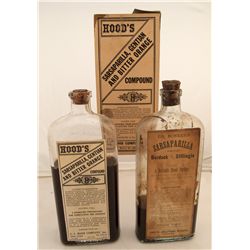 Two rare sarsaparilla bottles with paper labels and one with original box