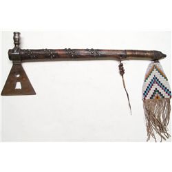 Indian peace pipe and axe