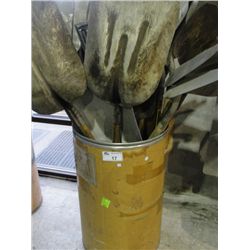 BARREL OF ASSORTED SHOVELS