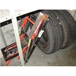 2 NOKIAN 235-75R15 TIRES AND A MOTOMASTER MOTORCYCLE JACK