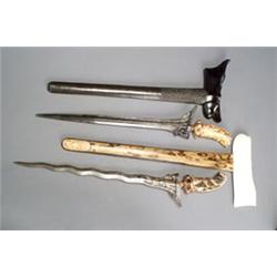 Pair of Indonesian Jeweled Gold Handled Kris...