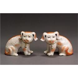 Pair of Chinese Export Parcel Gilt and Iron-Red Glazed Biscuit Figures of Seated Spaniels...