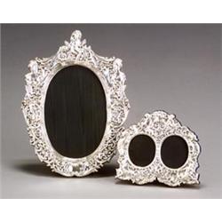 Two Rococo Style Sterling-Mounted Strut Photo Frames...