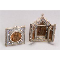 Two Russian Silver and Enameled Carved Wood Icons...