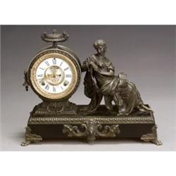 American Patinated Metal and Faux Slate Figural Mantel Clock...