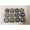 Image 2 : LOT OF 12 NHL SIGNED PUCKS INCL: BRETT HULL, MIKE MODANO, ROBERTO LUONGO, ADAM OATES AND MORE!