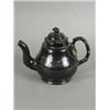 Image 1 : An 18th century Jackfield pottery teapot and cover, (some damage), 14cm high Est. 80/150...