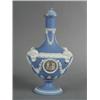 Image 1 : A Wedgwood two colour Jasperware 'Barber Bottle' and cover, circa 1870-1880, pattern no. 1110. Th...