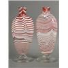 Image 1 : A pair of 19th century Nailsea candy stripe vases, supported upon wide circular bases, 24cm high...