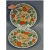 Image 1 : A pair of 19th century Japanese chargers, each with moulded chrysanthemums and leaves, painted in...