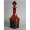 Image 1 : A 19th century red glass decanter and stopper, 29cm high Est. 150/200...