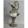 Image 1 : A continental majolica style ewer, with a relief band of cherubs and leaf moulding, impressed dou...