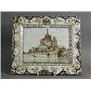 Image 1 : A late 19th century Faience wall plaque decorated with a view of 'Mont-Saint-Michel', 20cm diamet...