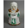 Image 1 : A Victorian tobacco jar modelled as robust man reading The Times newspaper in his dressing gown,...