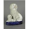 Image 1 : A 19th century Staffordshire encrusted spaniel, with two pups, 16.5cm Est. 80/120...