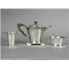 Image 1 : A silver four piece teaset, the teapot with stained handle and finial, a stand with ivory feet, s...