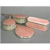 Image 1 : A pink enamel and silver five piece dressing table set, Birmingham 1947, 27cm Est. 100/150...