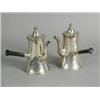 Image 1 : A pair of Edwardian silver coffee (?) pots with turned ebony side handles, retailed by Aspreys, 1...