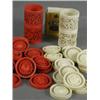 Image 1 : Thirty carved draught counters, fifteen stained red and fifteen natural and two carved ivory dice...