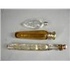 Image 1 : A late 19th century amber glass scent bottle with a hinging lid, a silver metal mounted teardrop...