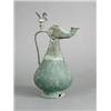 Image 1 : A 12th century Persian bronze jug, with bird finial (poor condition), 24cm high Est. 100/150...