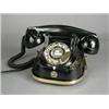 Image 1 : A 1940's bakelite and metal 'RTT' telephone Est. 80/120...