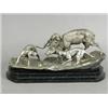 Image 1 : A 19th century silver plated spelter group of three dogs bringing down a stag, supported upon a b...