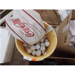 BUCKET AND COKE CASE OF GOLF BALLS