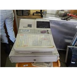 CASIO CASH REGISTER WITH KEYS AND BOOKS