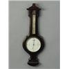Image 1 : An Edwardian inlaid mahogany wheel barometer, marked to dial 'Maple & Co, London', 86cm Est. 120/...